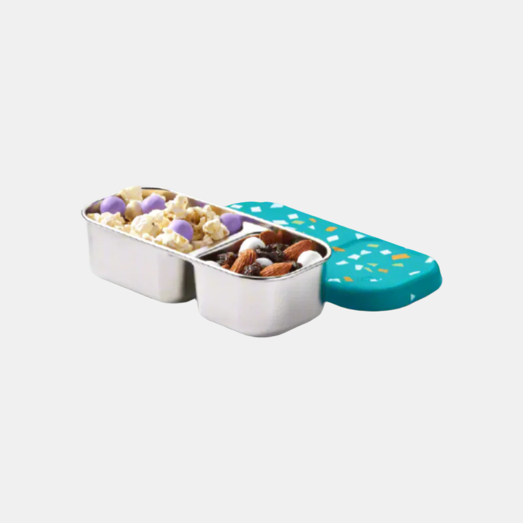 color::Lagoon Terrazzo | Open view of Day Tripper container. Popcorn with yogurt clusters in bigger side, Trail Mix in smaller side. Lid is off to the side on a white background. 