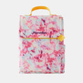 #color_Blossom Tie Dye | Pink tie dye fabric lunchbox with bright yellow details and Purple PlanetBox logo.