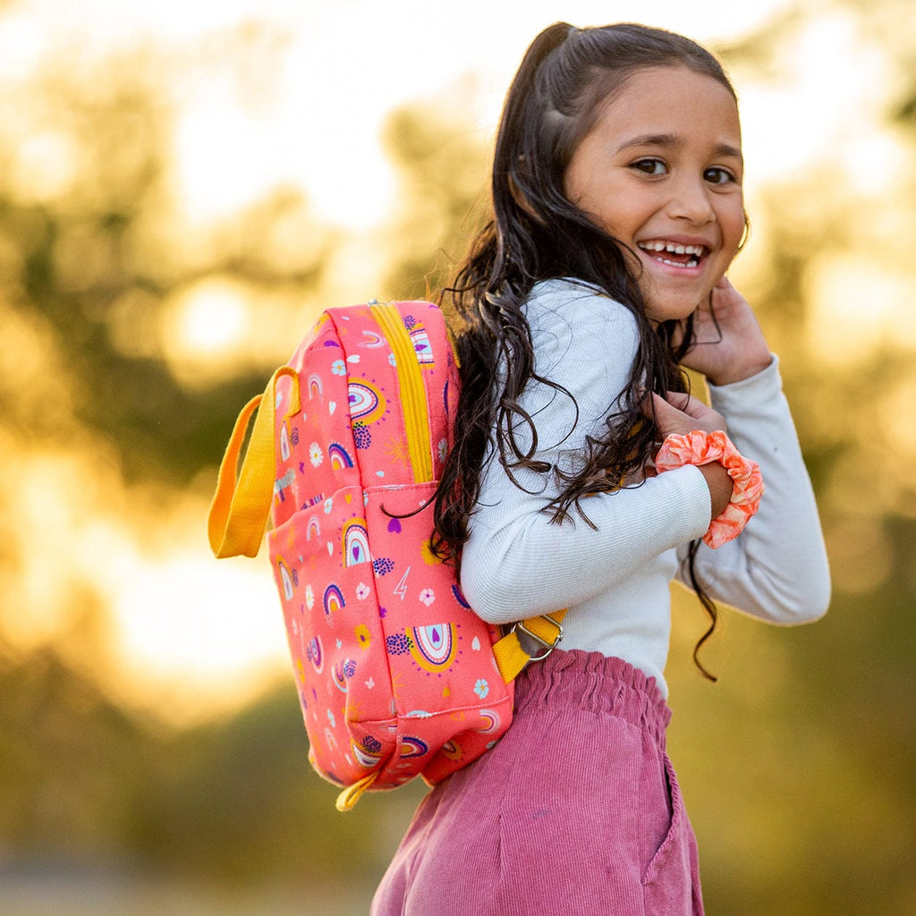 color::Peach Rainbow | Girl wearing Peach Rainbow lunch tote on back.
