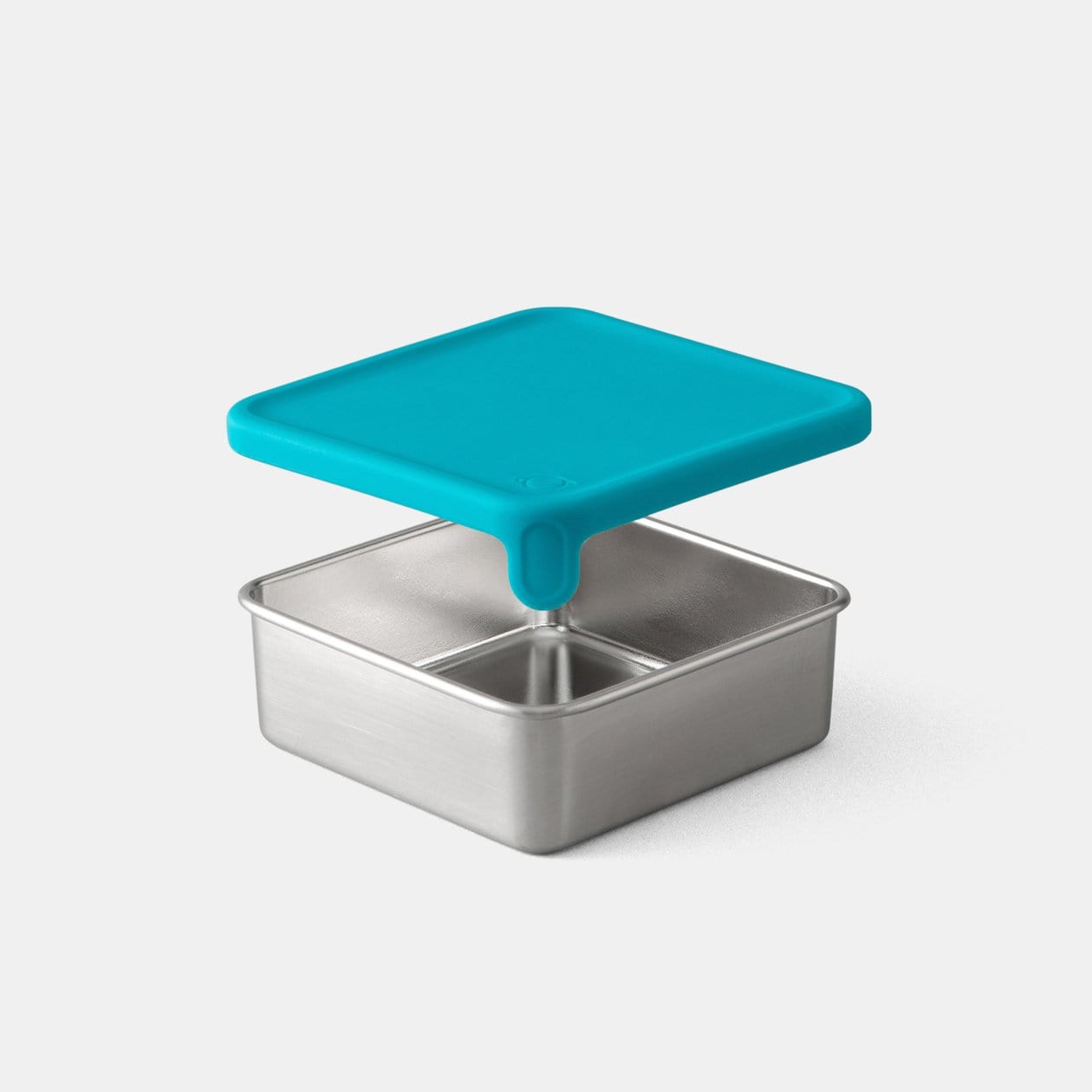Teal Big Square Dipper with lid hovering above container. 